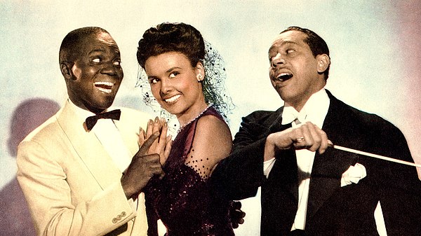 Left to right: Bill Robinson as Bill Williamson, Lena Horne as Selina Rogers, and Cab Calloway as himself.