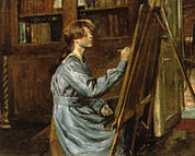 Kunstenares in haar atelier