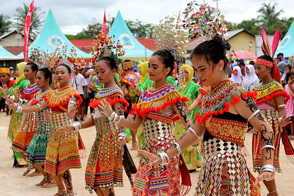 Iban maidens of Kapuas Hulu performing their traditional dance