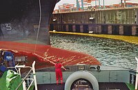 The head tractor gets a thin line from the container ship