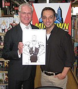 Jimenez with Tim Gunn at Midtown Comics Times Square in Manhattan, for the September 9, 2009 signing of Models, Inc., the first issue of which features Jimenez's illustration of Gunn on the cover, the art for which Gunn is holding in the photo