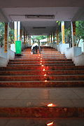 Tirumala, candles (6336223363).jpg