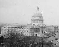 USS Los Angeles flies above the U.S. Capitol