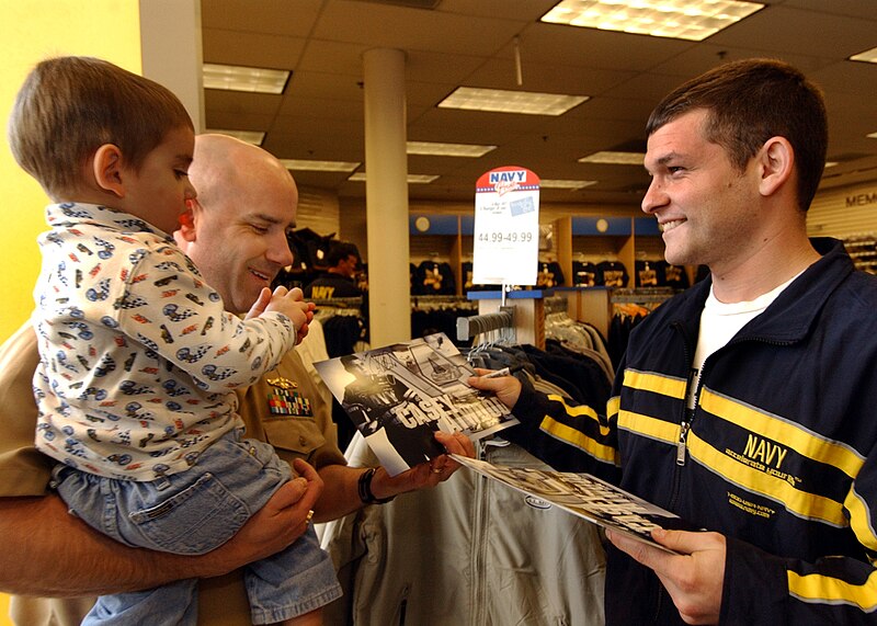 File:US Navy 040130-N-5576W-009 NASCAR's Casey Atwood, driver for the Number 14 Navy car in the Busch Series, chats with Lt. William Parker.jpg