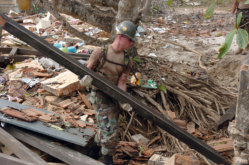 File:US Navy 050116-M-3295H-036 Builder 2nd Class Cortland W. Hurst assigned to Naval Mobile Construction Battalion Seven (NMCB-7), recover useable pieces of lumber from the badly damaged Ahangama Primary School in Ahangama, Sri Lan.jpg