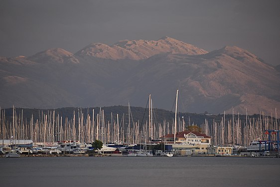 Wharf in Preveza, Greece, with mountains in the background.