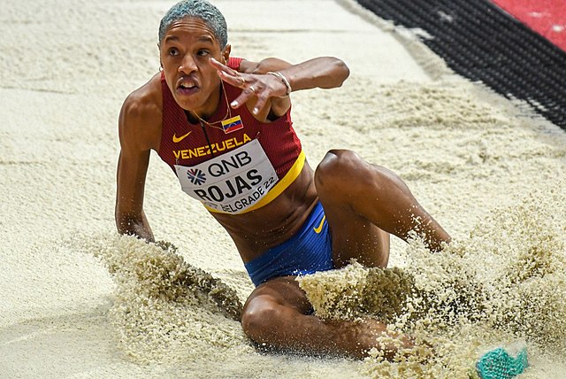 Yulimar Rojas landing the women's world record triple jump at the 2022 World Athletics Indoor Championships in Belgrade on 20 March 2022
