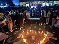Акция зажжения свечей в память о жертвах пожара в Урумчи