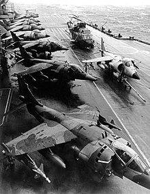 Sea Harriers on board HMS Hermes in the Falklands on 19 May 1982 with 3 RAF Harrier GR3s in the foreground. 100 years of the RAF MOD 45163716.jpg