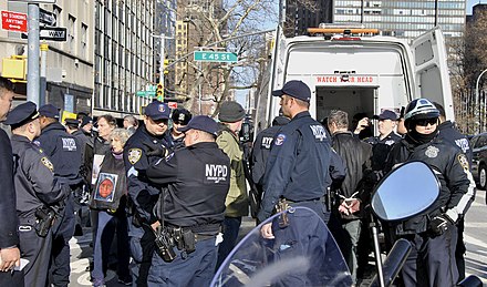 Protesters against the US-backed Saudi-led war on Yemen were led away handcuffed by New York police outside the US mission to the UN on 11 December 2017