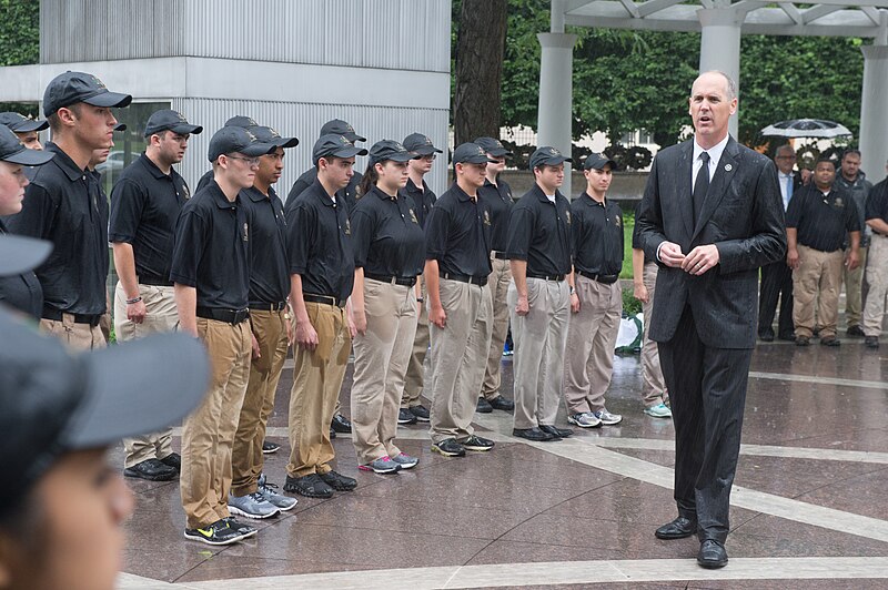 File:2015 Law Enforcement Explorers Conference standing at attention in downpour.jpg