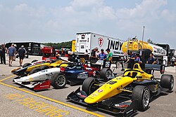 Abel Motorsports Indy NXT cars in the paddock at Road America, 2023 2023 Indy NXT, Road America (53068833098).jpg