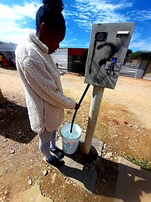 Drinking water supply A community water card tap.jpg