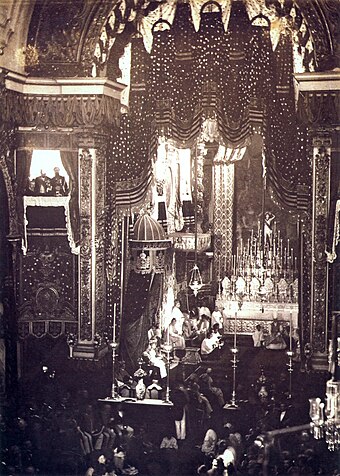A state ceremony in the Old Cathedral of Rio de Janeiro; the attendees are wearing court dress.