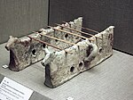 Akrotiri terracotta firedogs with zoomorphic finials.jpg