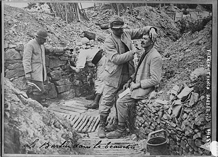 A barber in a French trench