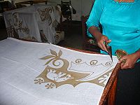 Applying a batik resist in Sri Lanka