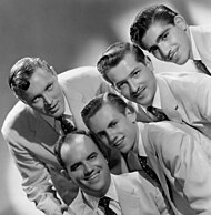 "Rock Around the Clock" by Bill Haley & His Comets was the number two song of 1955, and a breakthrough hit for rock and roll. Bill Haley and Comets 1956 (cropped).JPG