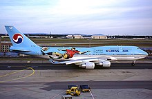 Korean Air Boeing 747 adorned with 2002 World Cup livery marking South Korea as co-hosts Boeing 747-4B5, Korean Air AN0241562.jpg