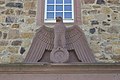 Deutsch: Adler von 1937 über dem Nordportal des westlichen Flügels des Schlosses