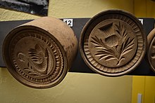 Carved butter stamps at Ceredigion Museum (photo by Jopparn) Ceredigion Museum 2018 06.jpg