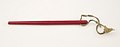 Collectie NMvWereldculturen, TM-3500-321, Rode houten naald met koord. Josephine Powell Collection, voor 1965.jpg