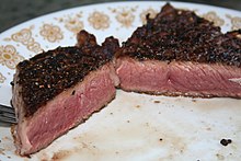 Meat with a dark exterior, common in high temperature cooking Delmonico steak.jpg