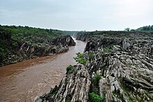 The River Narmada flows through a gorge of Marble rocks in Bhedaghat