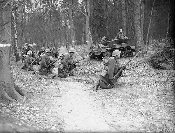 Infantry and Bren gun carriers of The West Nova Scotia Regiment in training at Aldershot, Hampshire, England, 29 February 1940.