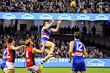 Wood marking the ball during a match in June 2017 Easton Wood marking.1.jpg