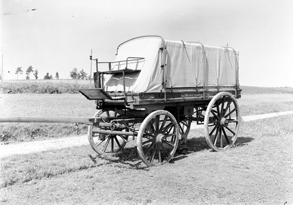 A covered mobile station wagon for homing pigeons