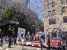 Healthcare workers being honored for their efforts in combatting COVID-19 during a July 7, 2021 ticker-tape parade for essential workers in New York, NY. Essential Worker Parade NYC 7 July 2021.jpg