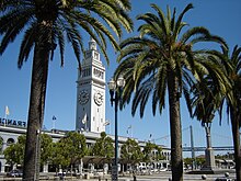 The Ferry Building, located in the Embarcadero, the city's eastern waterfront along San Francisco Bay FerryBuildingEmbarcaderoBayBridge.JPG