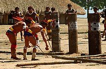 Quarup funeral ritual Festa do Kuarup danca em frente dos troncos.jpg