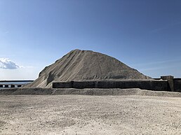 Lime is a sustainable material for energy efficiency. Furillen lime stone pile.jpg