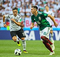 Héctor Herrera and Mesut Özil (Mexico v Germany) at the 2018 FIFA World Cup