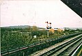 Some semaphore signals at Greenford station in 2002.