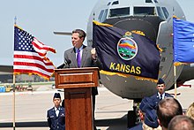 Governor Sam Brownback makes remarks at a ground breaking ceremony at McConnell Air Force Base. Kansas Governor Sam Brownback makes remarks at a ground breaking ceremony at McConnell Air Force Base.jpg