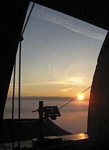 Sonnenuntergang durch den Kuppelspalt der Volkssternwarte Rothwesten