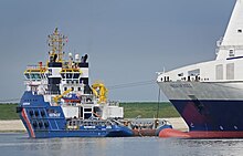 Netherlands Coastguard heavy towboat Guardian was one of the first ships on the scene. Livex 2019 (47942573432).jpg