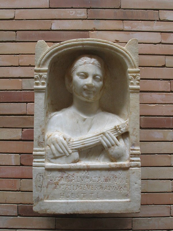 Spanish stele of a boy with a pandura.