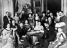 Scriabin (sitting on the left of the table) as a guest at Wladimir Metzl's home in Berlin, 1910 Metzl, Tatiana & Alexandr Scriabine, Nikisch, Shalapine, Kusevitsky, Berlin 14mar1910.jpg