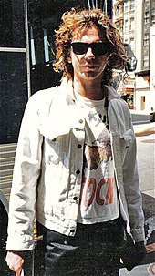 INXS frontman Michael Hutchence starred in Dogs in Space (1986), a film based on the Little Band scene. Michael-hutchence-INXS-1986.jpg