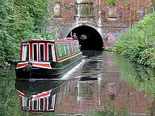 Brandwood Tunnel, eastern portal Narrowboat leaving the east portal of Brandwood Tunnel, Birmingham - geograph.org.uk - 1726035.jpg