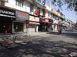 Khan Market in New Delhi, now a high-end shopping district, was established in 1951 to help refugees of the Partition of India, especially those from the North West Frontier Province (NWFP).  It honours Khan Abdul Jabbar Khan, Chief Minister of NWFP during the Partition.[60][61]