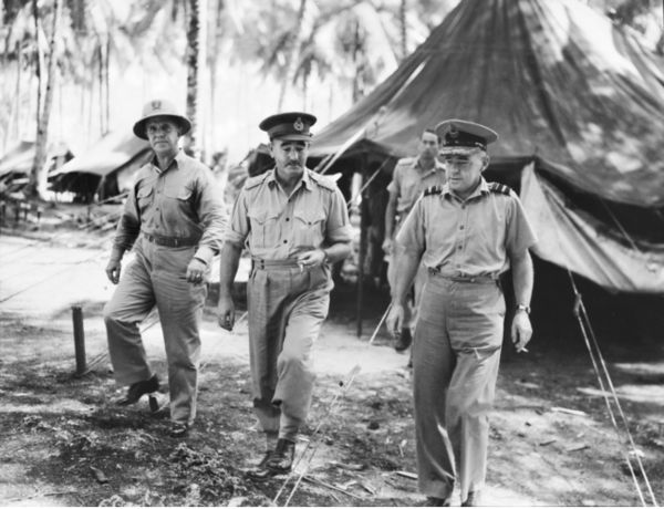 Bostock (right) with Australian I Corps commander Lieutenant General Sir Leslie Morshead (centre) and Rear Admiral Forrest B. Royal of the US Navy (le