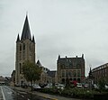 Dorpspomp, het voormalig gemeentehuis en de Onze-Lieve-Vrouwkerk