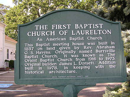 The historical plaque that adorns the church's lawn