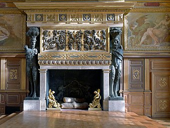 The monumental fireplace in the ballroom of the Palace of Fontainebleau (France), with a Doric frieze on it