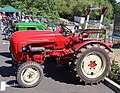 * Nomination Side view of a 1963 Porsche Junior tractor. --Palauenc05 10:38, 22 July 2022 (UTC) * Promotion  Support Good quality. --Wikibusters 14:44, 22 July 2022 (UTC)